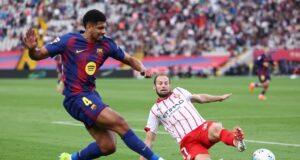 Barcelona pasó al liderazgo en España tras vencer a Girona 2-1 en el final